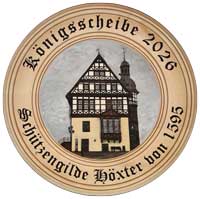 Die Königsscheibe 2026 der Schützengilde Höxter von 1595 zeigt das historische Rathaus Höxter als kunstvoll gestaltetes Motiv auf Ahornholz.